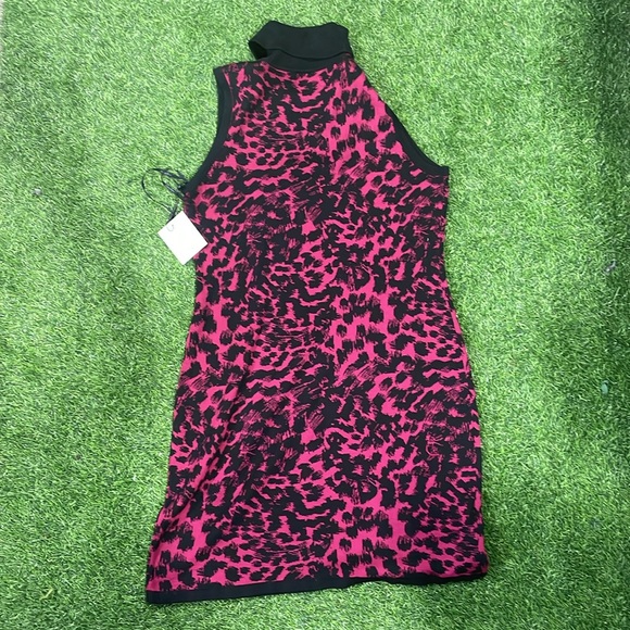 Ladies sleeveless turtleneck sweater dress with leopard print. - Picture 2 of 5